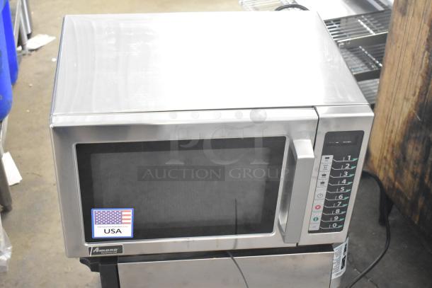 2022 Amana RCS10TS Commercial Microwave Oven. 120 volts, used, keypad controls, USA made badge visible.