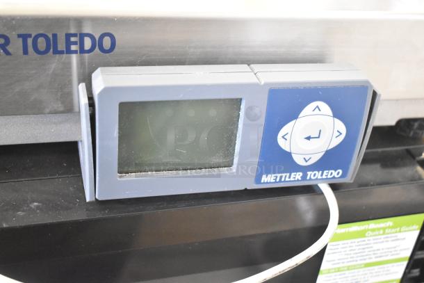 Mettler Toledo BC Countertop Scale, digital display visible, slight wear, sturdy metallic build, model BC, in working condition.