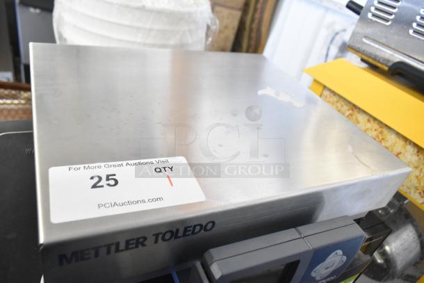 Mettler Toledo BC countertop scale with stainless-steel platform. Visible label for auction lot number. Good condition.