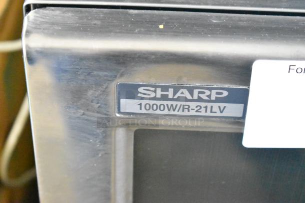 2025 Sharp R-21LVF Commercial Microwave Oven, stainless steel, 1000W, 120V, label visible, excellent condition.