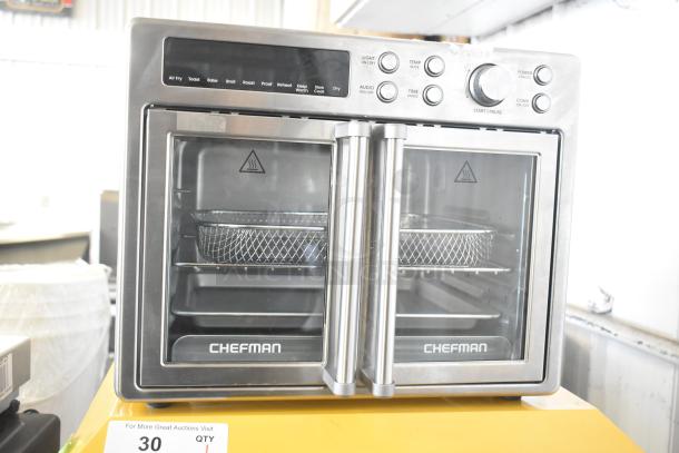 Chefman RJ50-FDAF-D25 Countertop Digital French Door Air Fryer + Oven, stainless steel, sleek design, dual doors, various cooking modes.