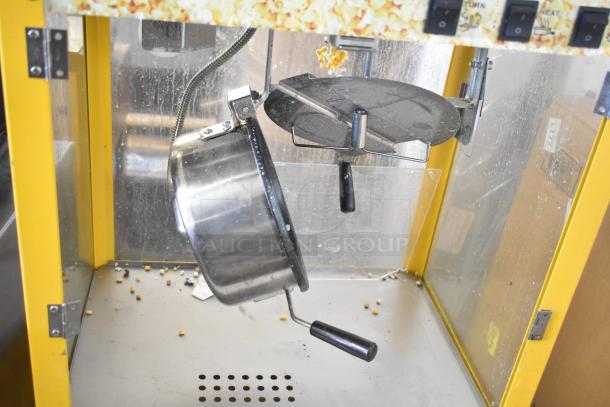 2019 OY-828 metal popcorn machine and merchandiser, commercial countertop model, 110 volts, visible kettle, minor wear.