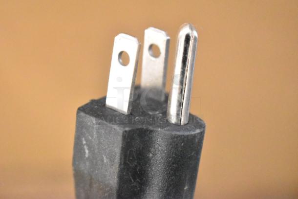 Close-up of a power plug for the 2019 OY-828 Metal Commercial Countertop Popcorn Machine, 110 Volts, 1 Phase.