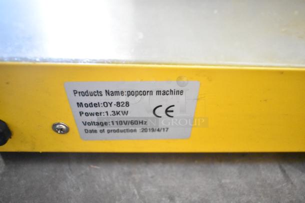 2019 OY-828 Metal Commercial Popcorn Machine, 1.3KW, 110V/60Hz, shown with label indicating model and specs.