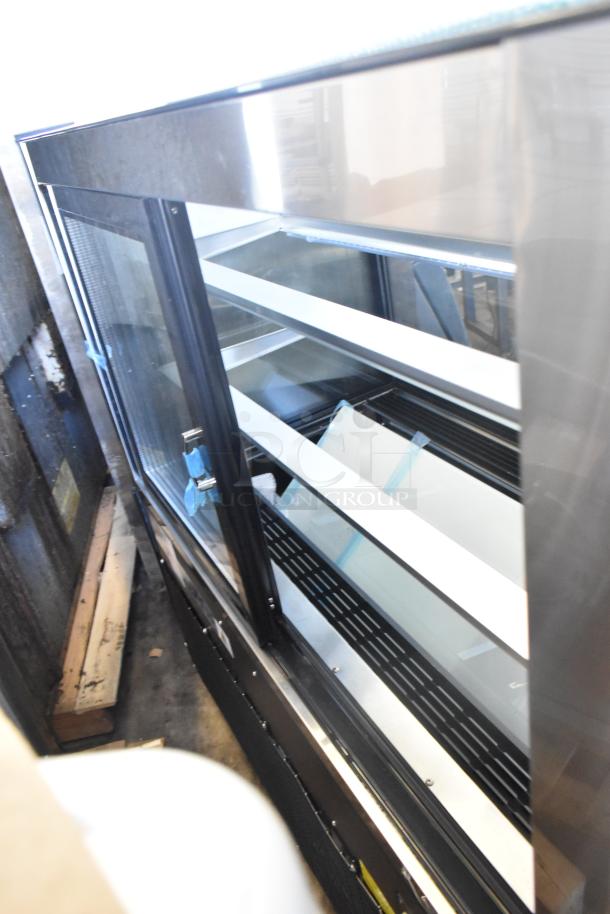 Brand new Avantco 193BC48HCB 48" refrigerated bakery display case with curved glass, black finish, on commercial casters.