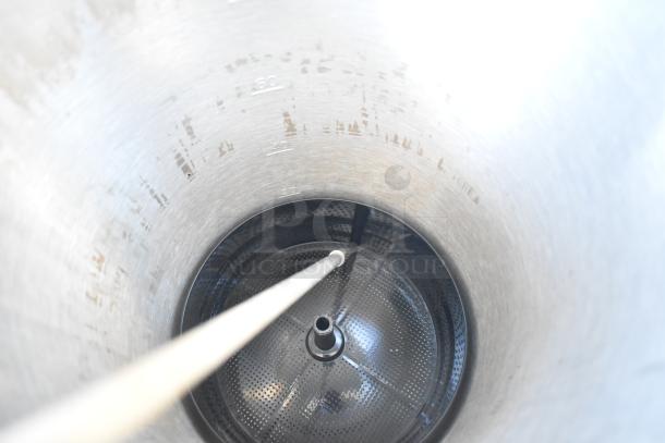 Brand new Proctor Silex countertop beverage dispenser, 115 volts, 1 phase, with visible minor scratches.