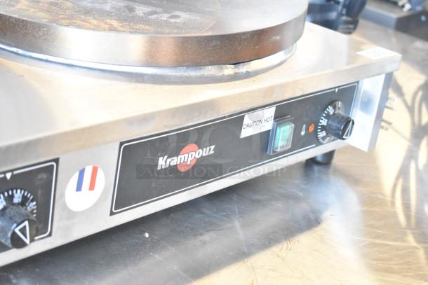Brand new Krampouz commercial countertop 2 burner crepe maker, scratch and dent, with visible labels "Caution Hot."