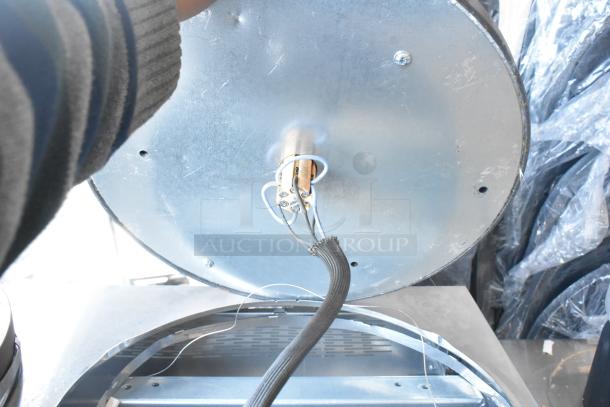 Brand new Krampouz commercial 2-burner crepe maker, scratch and dent condition, showing underside components.