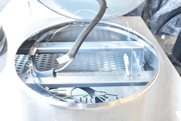Brand new Krampouz commercial 2-burner crepe maker with scratch and dent; wiring visible in open stainless steel casing.