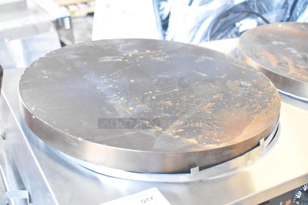 Brand new Krampouz commercial countertop crepe maker with 2 burners. Slight surface imperfections visible on the cooking plate.