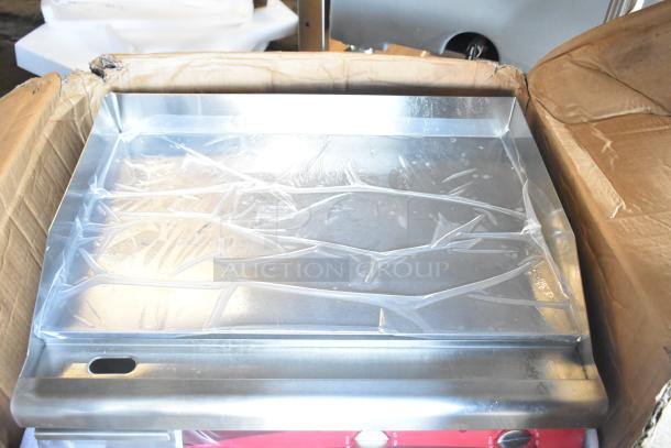 Brand new Avantco 177EG24N 24" electric countertop griddle, minor scratches and dents, 208/240V, 1 phase, protective film intact.