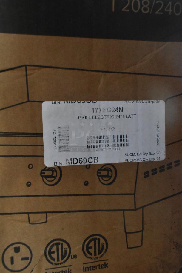Brand new Avantco 177EG24N 24" electric countertop griddle, 208/240V, 1 phase; scratch and dent condition, box label visible.