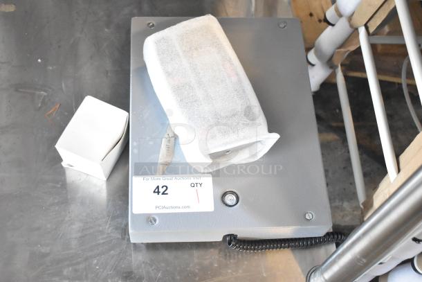 Avantco Torrey SR-50/100 digital scale, 100 lb. capacity, new with cosmetic dents, model 177EG24N, padded protection.