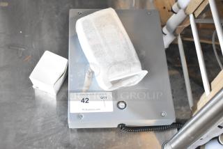 Avantco Torrey SR-50/100 digital scale, 100 lb. capacity, new with cosmetic dents, model 177EG24N, padded protection.