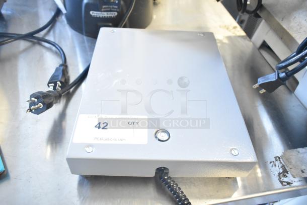 Brand new Torrey SR-50/100 digital scale, 100 lb. capacity, Avantco model 177EG24N, minor scratches, auction tag visible.