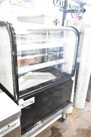 Brand new Avantco 193BCD36B 36" black dry bakery display case with curved glass; visible glass damage shown.