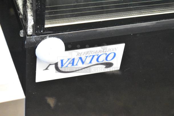 Avantco 193BCD36B bakery display case, black, curved glass, brand new with scratch and dent, visible broken glass.