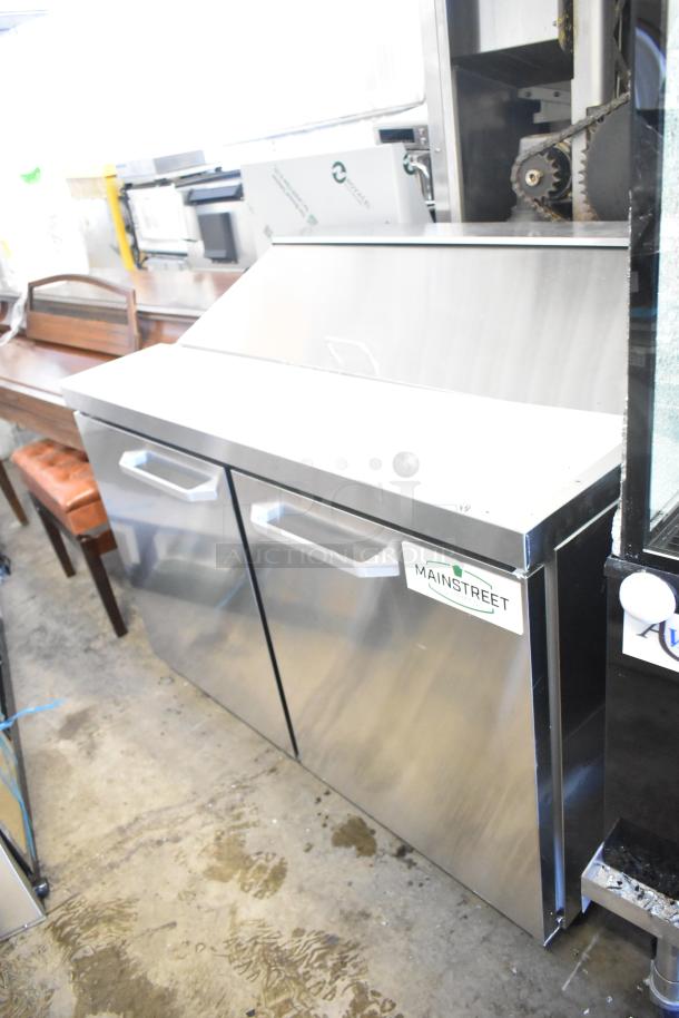 BRAND NEW Mainstreet 829PT48 48" 2-Door Refrigerated Sandwich Prep Table with casters, 115V. Scratch and dent condition.