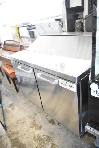 BRAND NEW Mainstreet 829PT48 48" 2-Door Refrigerated Sandwich Prep Table with casters, 115V. Scratch and dent condition.