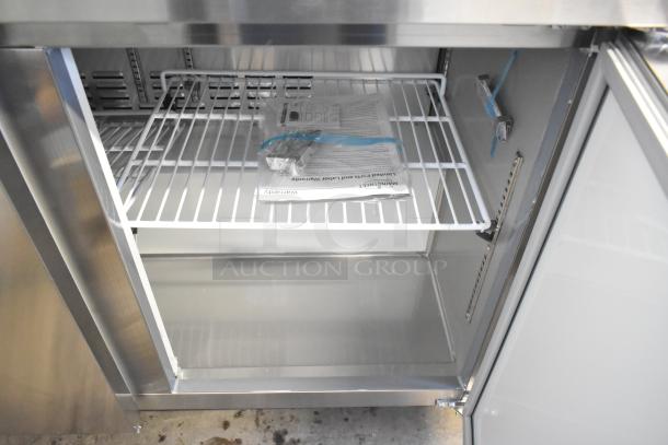 Brand new Mainstreet 829PT48 48" refrigerated sandwich prep table, 2-door, standard top, on commercial casters, 115V. Visible scratch and dent.