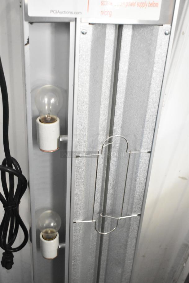 Brand new 2025 ServIt 423SW48TLCPA 48" lighted strip warmer, single toggle control, 120V, with visible cord and sockets.