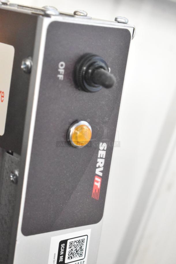 New ServIt 423SW48TLCPA 48" Lighted Strip Warmer, single toggle control, visible switch, minor scratch and dent.