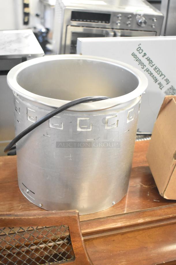 Brand new Wells SS10ULTDCI Drop In Food Warmer, 120V, 1 Phase, visible control panel. Minimal scratches evident.