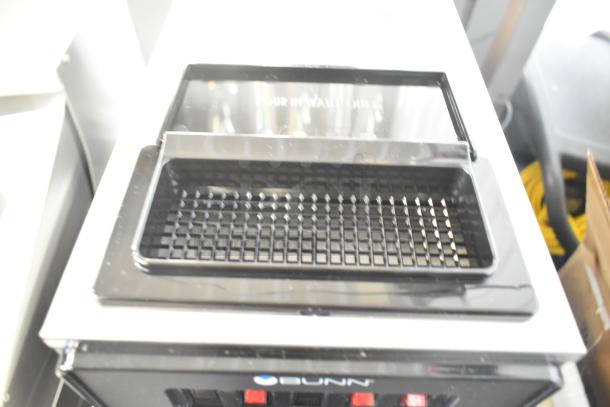 BRAND NEW Scratch and Dent 2025 Bunn VP17-3 Coffee Brewer with 3 Warmers, 120V, 1 Phase. Black exterior, pour-over only.