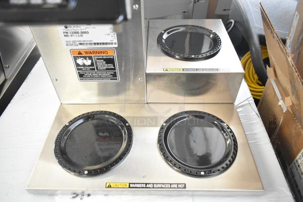 Brand new 2025 Bunn VP17-3 coffee brewer with 3 warmers, 120 volts. Visible caution and warning labels.
