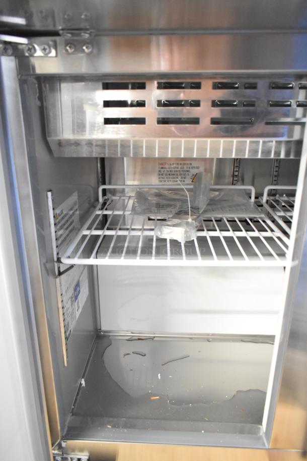 Brand new Avantco 178APT36MHC 2-Door Mega Top Refrigerated Sandwich Prep Table, 2023 model, 115V, minor scratches.