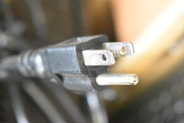 Close-up of a power plug for the Avantco 178GDC15HCB refrigerator. 115 volts, still in brand new condition.
