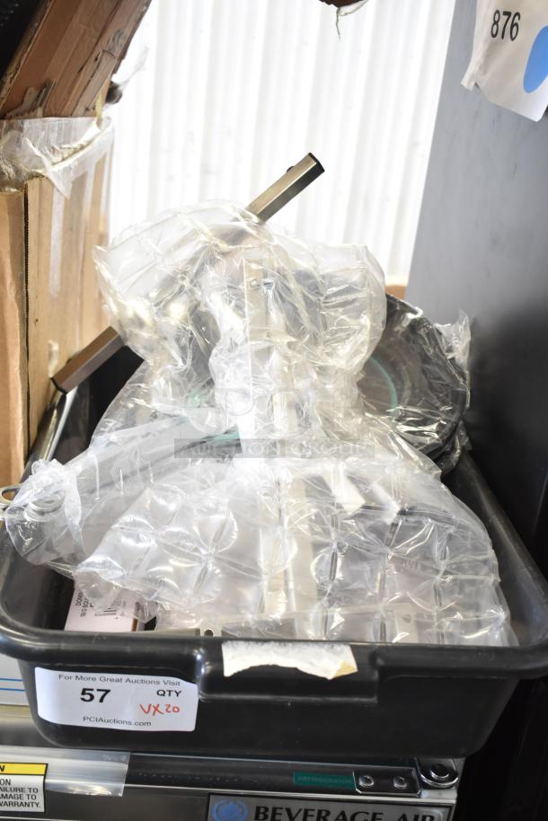 Box of 20 brand new scratch and dent items, including Choice 10" non-stick fry pans and Dominion stainless steel bouillon spoons.