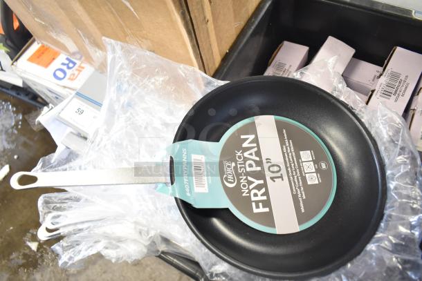 20 brand new "scratch and dent" items including a Choice 10" aluminum non-stick fry pan, visible label with specs.