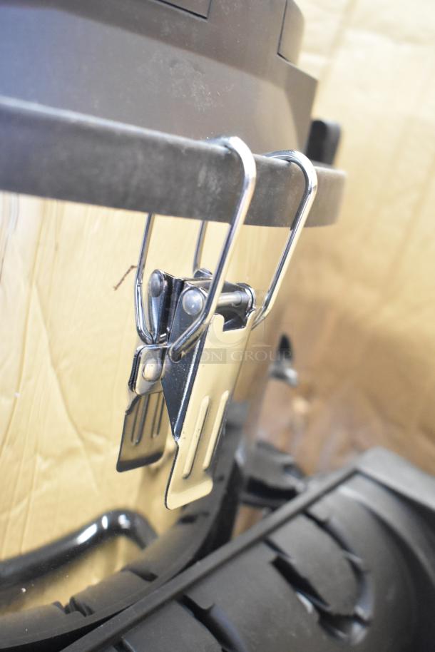 Lavex 16-gallon stainless steel wet/dry vacuum, scratch, and dent model. Features visible hose clip detail.