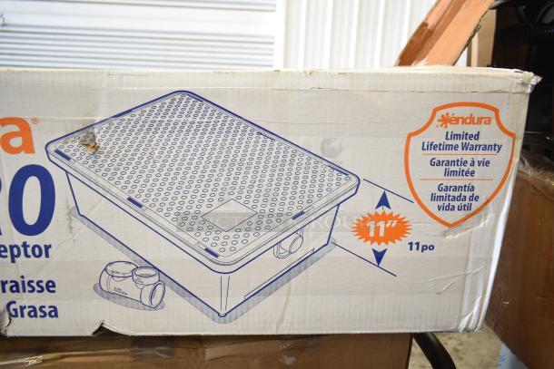 Brand new Endura 3925A02LO Lo-Pro grease trap, 50 lb., 25 GPM, 2" hub, with limited lifetime warranty. Box shows dents.