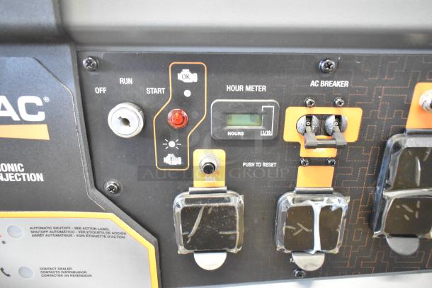 Control panel of a Generac GP18000EFI generator, featuring hour meter, AC breaker, and 30A outlets. Brand new, model 7498917.
