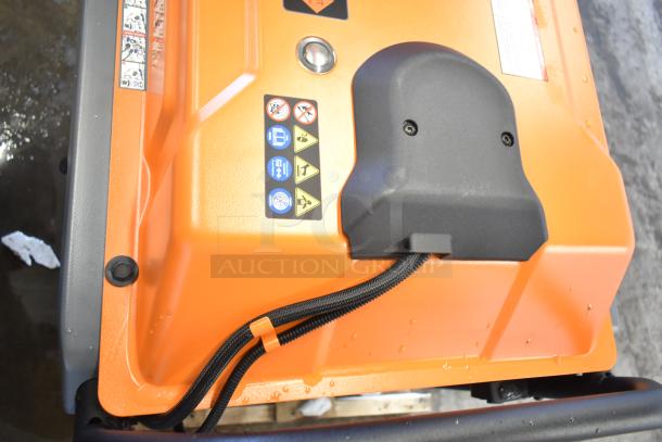 BRAND NEW Generac GP18000EFI portable generator, electric start, model 7498917, scratch and dent condition, orange casing.