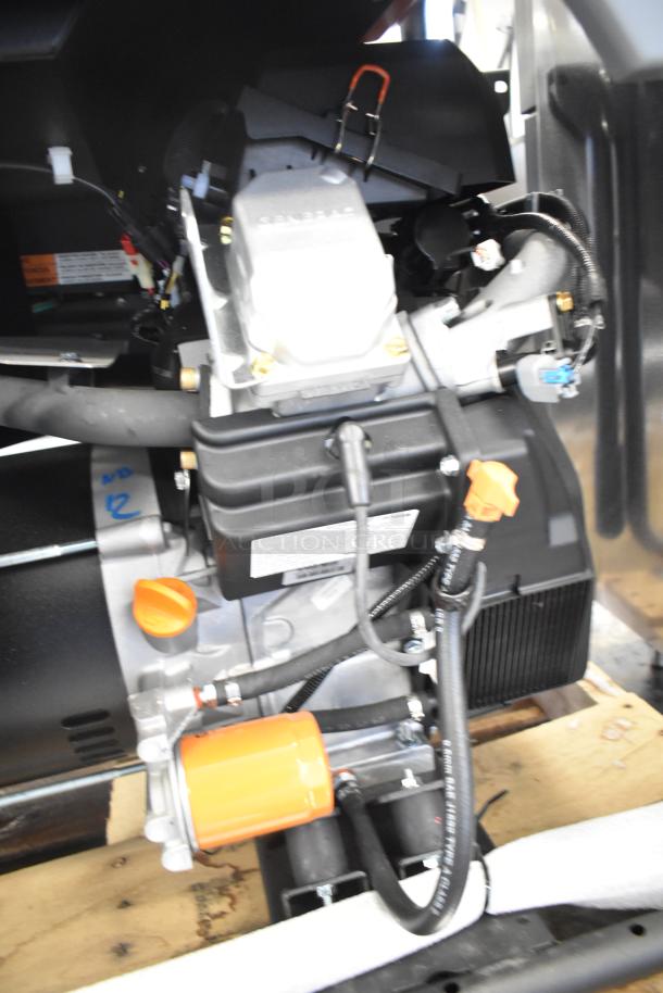 Brand new Generac GP18000EFI generator, model 7498917, showing engine and components, 18,000W capacity. Electric start.