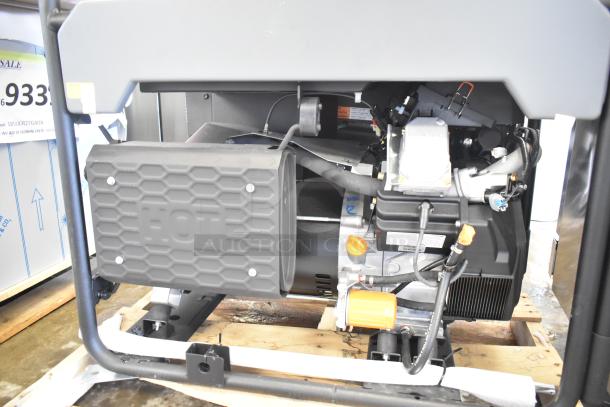 Brand new Generac GP18000EFI portable generator, model 7498917, with electric start. Visible "HOT" marking on heat shield.