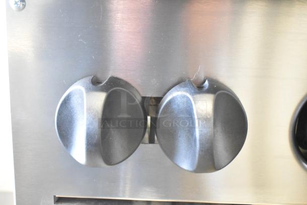 Close-up of control knobs on Vulcan 24S-4BN commercial gas range. Brand new, scratch and dent condition.