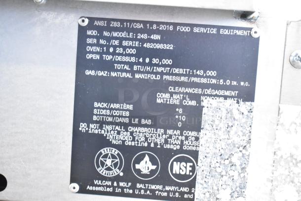 "Label of Vulcan 24S-4BN commercial range, showing specifications: 143,000 BTU, natural gas, ANSI certified, NSF logo."