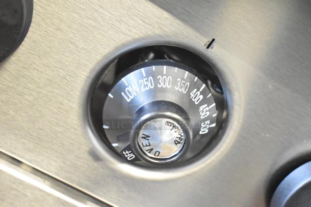 Control dial of Vulcan 24S-4BN range, displaying temperature settings from low to 500°F for oven use.