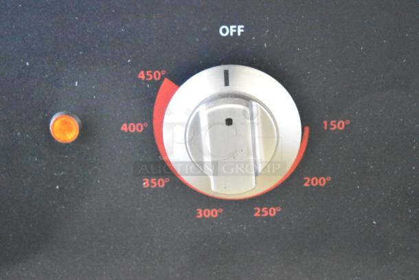 Close-up of a temperature control knob on a Cooking Performance Group GU-CPG-36-M griddle, marked from 150°F to 450°F.