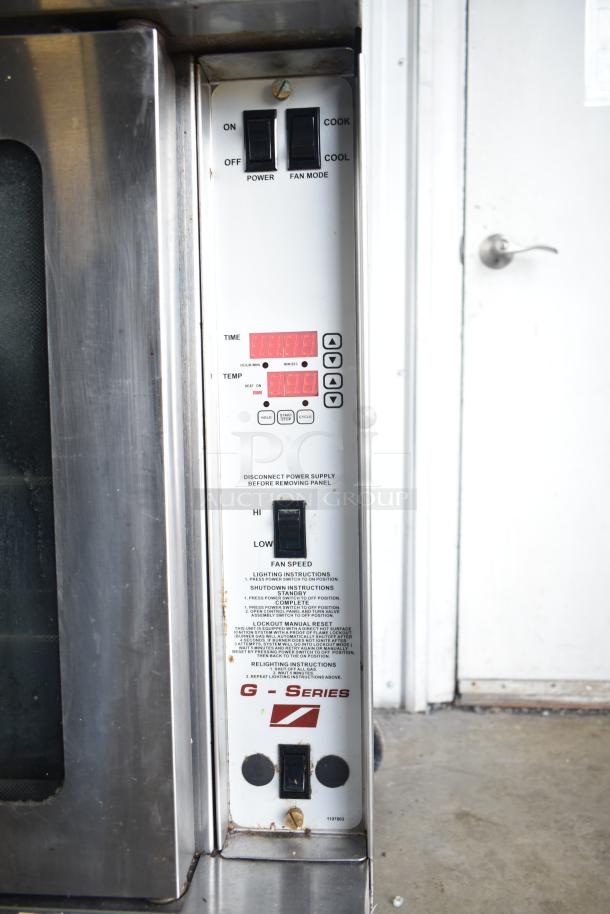 Southbend G Series gas convection ovens with view-through doors, thermostatic controls, and commercial casters.