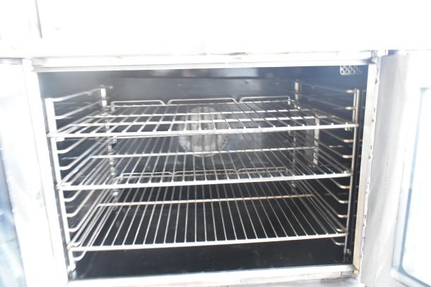 Southbend G Series convection oven with view-through doors and thermostatic controls on casters, in good condition.
