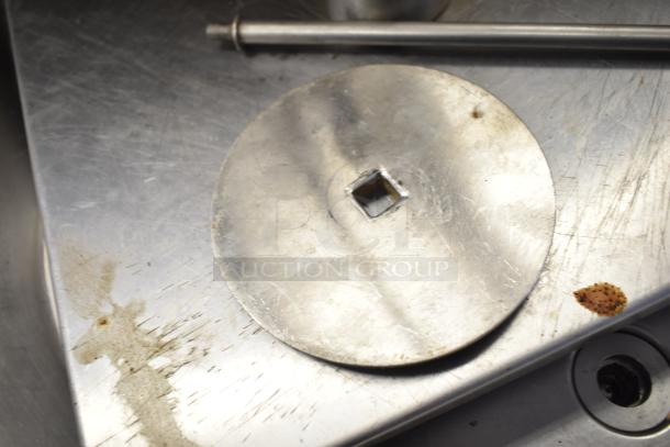 Inoksan Commercial Doner Grill part; metal plate with square center hole; visible wear and residue; for gyro machine.