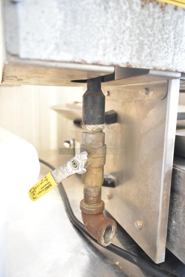 Inoksan commercial countertop vertical gyro machine, doner grill, 115 volts, visible valve. Used condition.