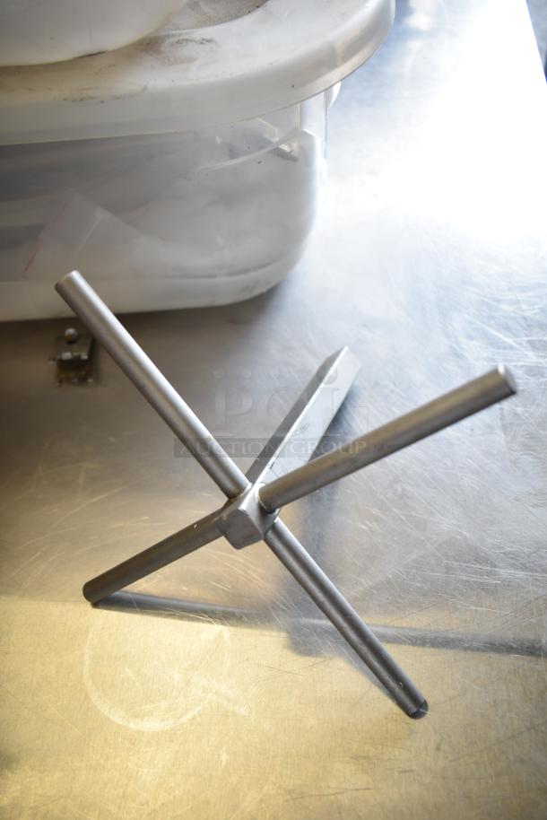 Stainless steel component of Inoksan Doner Grill; sturdy metal crosspiece, commercial-grade, clean condition.