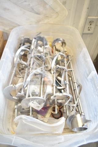 Two bins of Taylor ice cream machine parts, including augers. Various components, used condition, suitable for repairs.