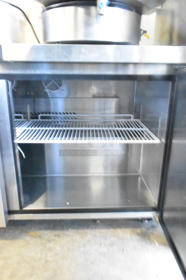 2024 Atosa MGF8403GR commercial 2-door undercounter cooler on casters. Stainless steel, 115 volts, 1 phase, excellent condition.